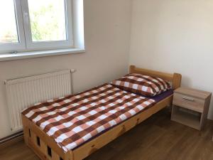 Voodi või voodid majutusasutuse Sleep & Go Korycany toas