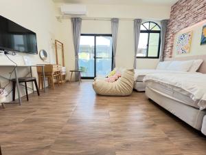 Cama o camas de una habitación en Manman Homestay