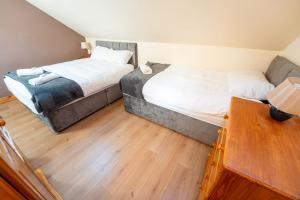 Letto o letti in una camera di Aras Ghleann Cholm Cille