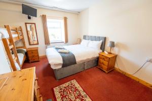 Letto o letti in una camera di Aras Ghleann Cholm Cille