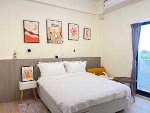 Cama o camas de una habitación en Manman Homestay