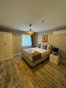 Postel nebo postele na pokoji v ubytování Valinor Balıklıova