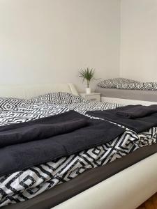 Postel nebo postele na pokoji v ubytování Leander House