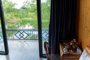 Balkón nebo terasa v ubytování Bungalow Ven Sông
