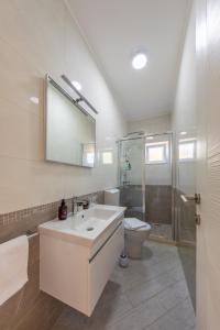Kúpeľňa v ubytovaní Apartment Pavlović