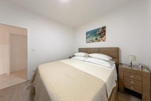 Posteľ alebo postele v izbe v ubytovaní Apartment Pavlović