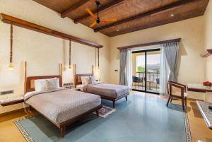Postel nebo postele na pokoji v ubytování Chavri Resort - Jawai