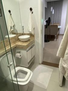 Ένα μπάνιο στο Apto aconchegante em contagem