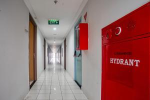 Gallery image of OYO 94080 Apartemen Podomoro Golf View Palito Rooms in Tjikuda Tiga +21 photos