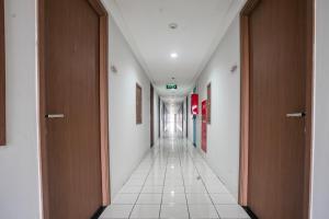 Gallery image of OYO 94080 Apartemen Podomoro Golf View Palito Rooms in Tjikuda Tiga