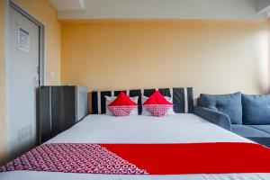 Gallery image of OYO 94080 Apartemen Podomoro Golf View Palito Rooms in Tjikuda Tiga