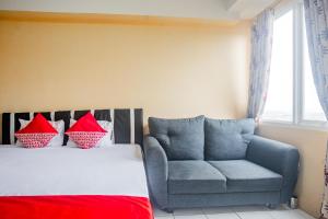 Gallery image of OYO 94080 Apartemen Podomoro Golf View Palito Rooms in Tjikuda Tiga