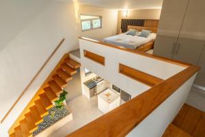 a bedroom and a bed in a small room at Jarko Luxury Houses in Argoulidhés