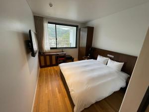 Postel nebo postele na pokoji v ubytování Goto Islands Resort Hotel Margherita Narao + 62 fotografií