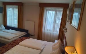 Ein Bett oder Betten in einem Zimmer der Unterkunft Hotel Beretta