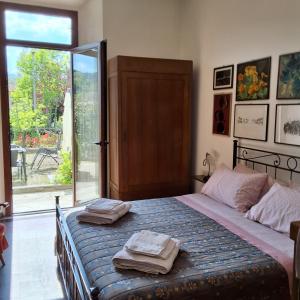 Postel nebo postele na pokoji v ubytování Casa di Bruna