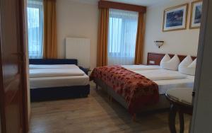 Ein Bett oder Betten in einem Zimmer der Unterkunft Hotel Beretta