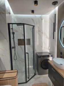 Ένα μπάνιο στο Apartament Roztocze +44 φωτογραφίες