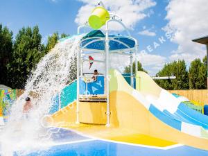 a water slide at a water park at 3 bedroom Static Home by White Horse, Seal Bay in Selsey