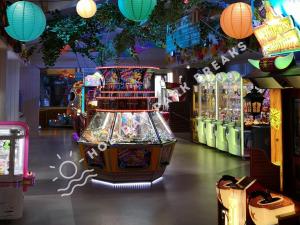 a pinball game in a store with lights and lanterns at 3 bedroom Static Home by White Horse, Seal Bay in Selsey