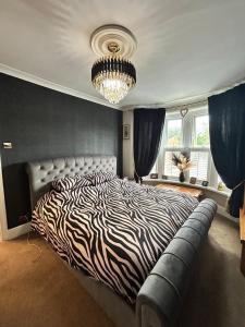 เตียงในห้องที่ Luxury 2 Bed House with Hot Tub