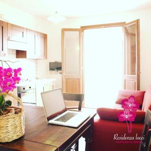 Kuchyň nebo kuchyňský kout v ubytování Residenza Locci - Rooms & Apartments