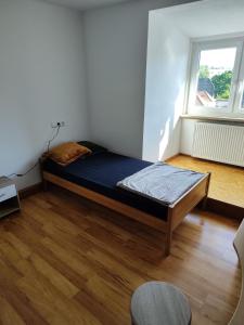 Postel nebo postele na pokoji v ubytování Monteurdomizil