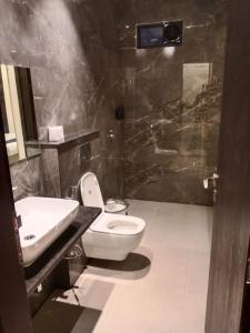 Koupelna v ubytování Hotel Grand Empire