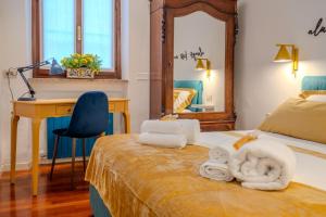 Postel nebo postele na pokoji v ubytování Case Ospitali - Casa La Fontanella, suggestivo bilocale x2 in corte