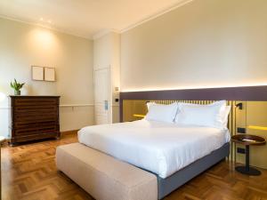 Postel nebo postele na pokoji v ubytování UNA HOTELS One Catania