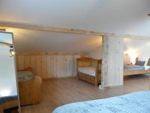 Postel nebo postele na pokoji v ubytování La Flémingîte