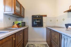 Kuchyň nebo kuchyňský kout v ubytování Casa di Leo - HelloElba