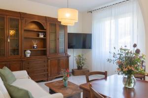 TV a/nebo společenská místnost v ubytování Casa di Leo - HelloElba