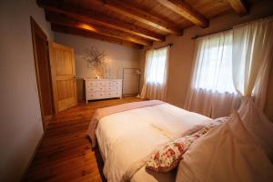 Posteľ alebo postele v izbe v ubytovaní Gemütliches Ferienhaus In Feistritz Ob Bleiburg