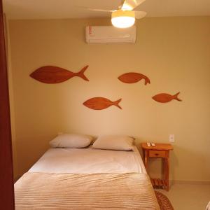 Kite House Lençóis II客房内的一张或多张床位