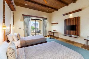 Postel nebo postele na pokoji v ubytování Chavri Resort - Jawai