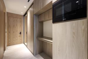 TV a/nebo společenská místnost v ubytování Livbnb - Stylish Studio in JVC, Near Parks and Shops