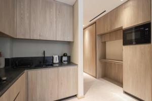 Kuchyň nebo kuchyňský kout v ubytování Livbnb - Stylish Studio in JVC, Near Parks and Shops