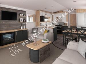 a living room with a couch and a dining room at Coopers Corner - Stylish 2 bedroom home, Seal Bay - Pets Welcome in Selsey