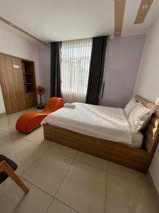 Postel nebo postele na pokoji v ubytování Hà Linh Hotel Vũng Tàu