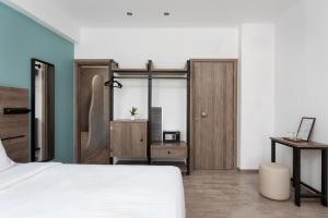 Postel nebo postele na pokoji v ubytování Sette Suites & Rooms - Adults Only