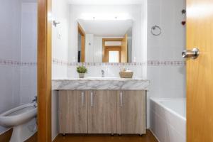 Koupelna v ubytování UHC Marathon Apartments