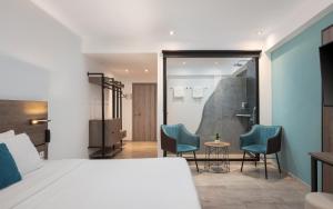 Postel nebo postele na pokoji v ubytování Sette Suites & Rooms - Adults Only
