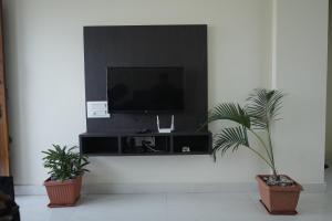 TV a/nebo společenská místnost v ubytování Kalgadde