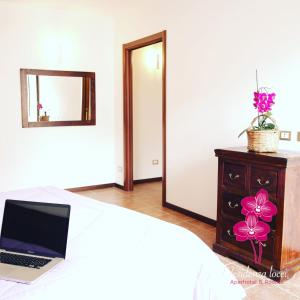 Postel nebo postele na pokoji v ubytování Residenza Locci - Rooms & Apartments