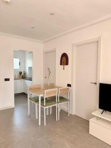A kitchen or kitchenette at Apartamento en la Playa Els Terrers 2