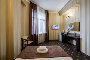 TV a/nebo společenská místnost v ubytování Hotel Verhovina