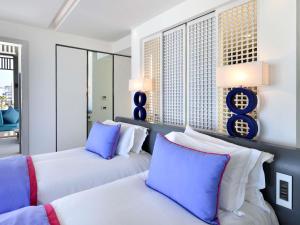 Voodi või voodid majutusasutuse Sofitel Tamuda Bay Beach And Spa toas