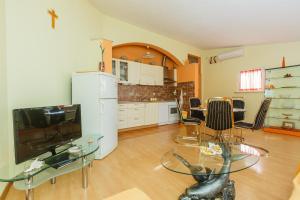 Kuchyň nebo kuchyňský kout v ubytování Apartman Lucija