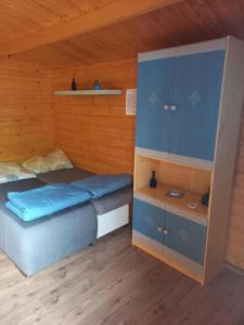 Postel nebo postele na pokoji v ubytování Napfény Camping